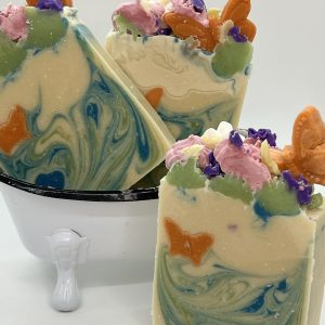 Butterfly Garden goat milk soap with handcrafted soap flowers and butterfly details