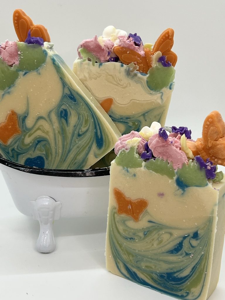 Butterfly Garden goat milk soap with handcrafted soap flowers and butterfly details
